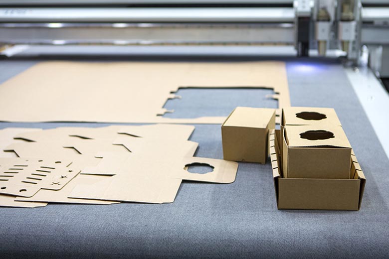 Industrial die-cutting machine for paper box production