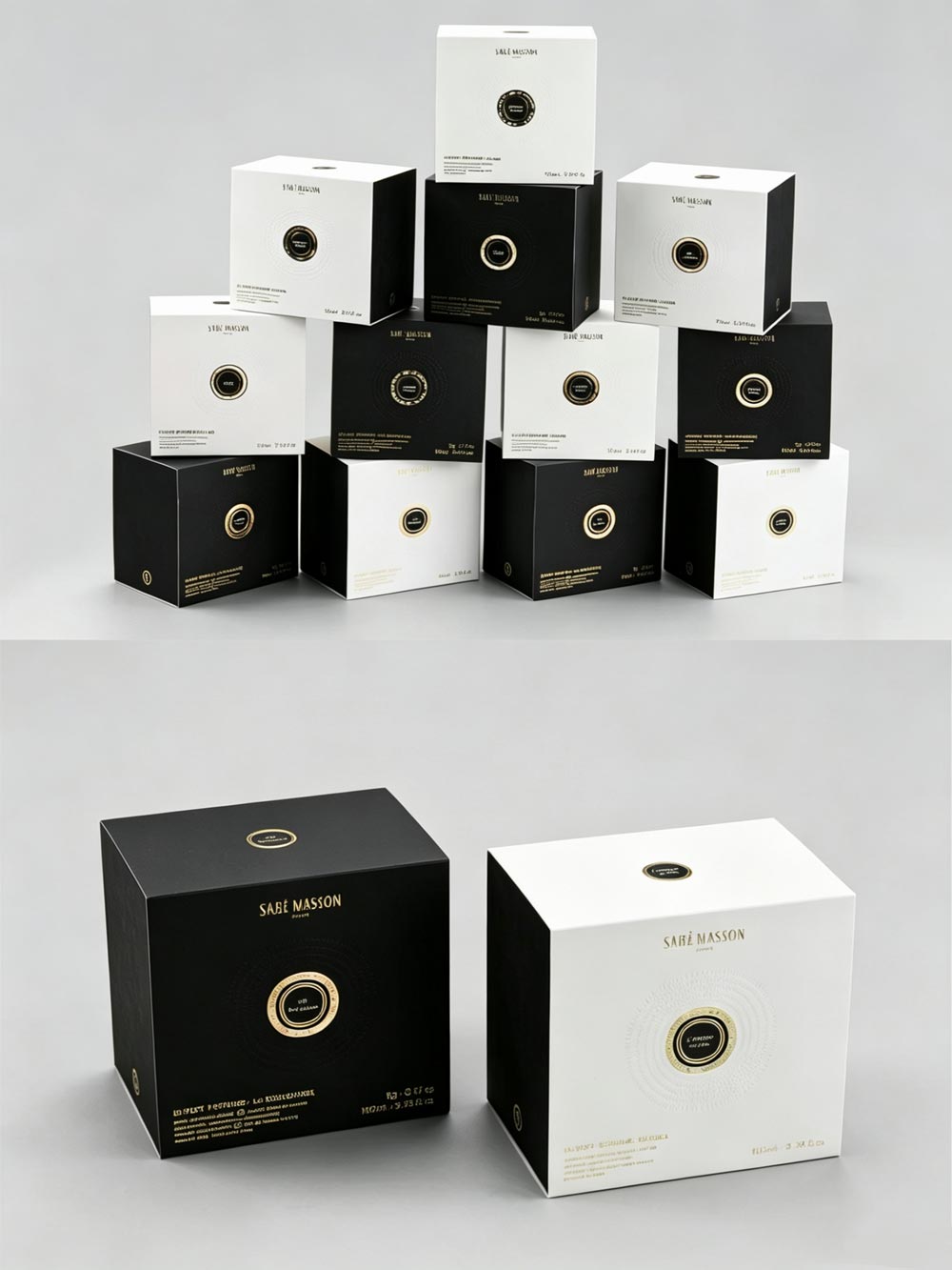 Stacked rigid boxes in contrasting black and white with gold foil emblems